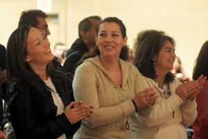 Catholic Celebration attendees sing at one of the day's Spanish language break-out sessions. (Dianne Towalski/The Catholic Spirit)