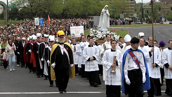 Marchers head up John Ireland Boulevard on the way to the Cathedral of St. Paul during the 65th annual May Day Family Rosary Procession May 6. Among the more than 1,000 attendees was Bishop Lee Piché, who made remarks at the State Capitol shortly before the march began. This year’s procession was offered in a particular way for the courage and grace to defend and promote marriage as the lifelong union between one man and one woman.