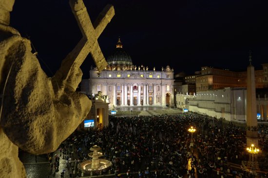 Despite the rain, thousands of people filled St. Peter's Square after dark March 12, the first evening of the conclave, to witness the black smoke that signaled the Catholic Church's 115 cardinal electors had failed, as expected, to elect a pope on the first ballot. CNS photo/Alessandro Bianchi, Reuters