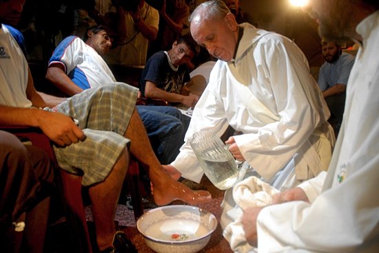 Cardinal Jorge Mario Bergoglio, now Pope Francis, washes the feet of residents of a shelter for drug users during Holy Thursday Mass in 2008 at a church in a poor neighborhood of Buenos Aires, Argentina. CNS photo / Enrique Garcia Medina, Reuters