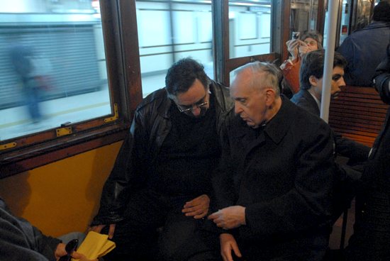 Argentine Cardinal Jorge Mario Bergoglio, right, now Pope Francis, is pictured traveling by subway in Buenos Aires in 2008. CNS photo / Diego Fernandez Otero, Clarin handout via Reuters