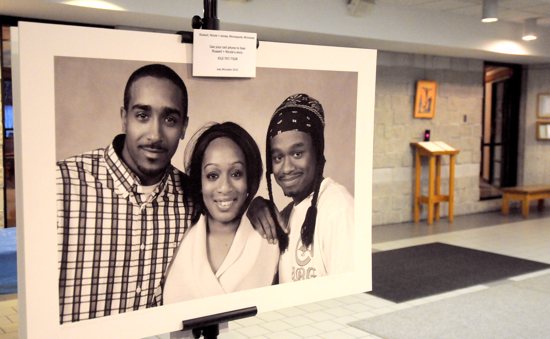 This photo from the “Homeless is My Address, Not My Name” portrait exhibit at St. John Neumann in Eagan features “Russell, Nicole and James” of Minneapolis. It was taken by photographer Joey McLeister in 2010. Dianne Towalski / The Catholic Spirit
