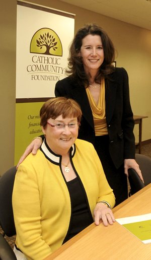 Catholic Community Foundation president Marilou Eldred, left, will retire April 30. Anne Cullen Miller will begin in that position May 1. Dianne Towalski / The Catholic Spirit
