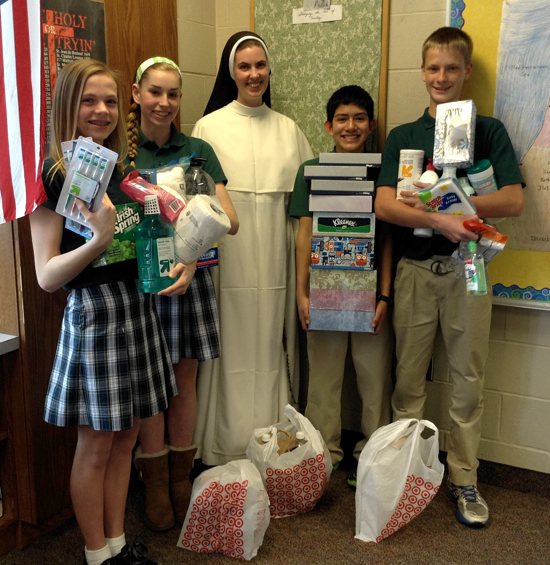 St. Croix Catholic School in Stillwater held an all-school collection of personal hygiene items April 8. Coordinated by the eighth-grade class, the collection will continue through the month of April. Photo courtesy of St. Croix Catholic School 