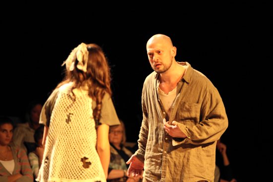 The young Alessandro Serenelli, played by Jeremy Stanbary, talks with Maria Goretti, portrayed by Katie Law-Gotich, in a scene from “Mercy Unrelenting.” Jen Frederickson, La Cattura Photography