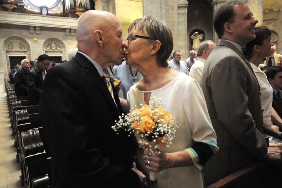 Denny and Judy O’Hagan, members of St. Mary of the Lake in Plymouth, shared a kiss after renewing their marriage vows during the Mass. The O’Hagans have been married 50 years. “He makes me laugh,” Judy said when asked the secret to a good marriage. “A lot of humor and wonderful children and grandchildren,” Denny added.