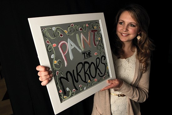 Angela Deeney of Holy Name of Jesus in Wayzata and a senior at the University of St. Thomas is embarking on her Lenten pledge to avoid looking in the mirror until Easter Sunday. As a reminder of her commitment, she has painted a message on her own mirror that conveys her theme for Lent. (Dave Hrbacek / The Catholic Spirit)