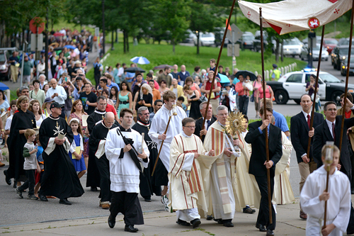 Archbishop John Nienstedt leads the 18th annual Archdiocesan Corpus Christi Procession through Loring Park and back to the Basilica of St. Mary in Minneapolis June 22. Photo by Jim Bovin