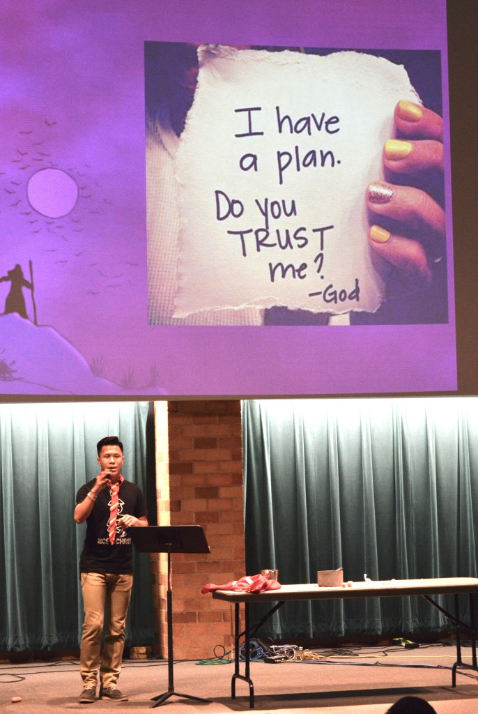 Phat Tran shares his faith journey at the central region convention of the Vietnamese Eucharistic Youth Movement July 18 at the University of St. Paul.