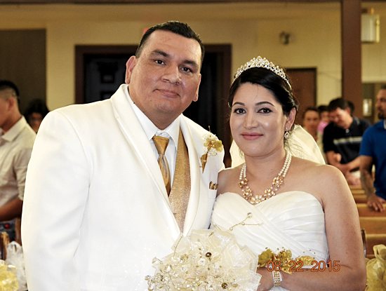 Victor Torres Limon Lucia Torres Ramirez pose for photos after their wedding ceremony at St. Joseph Church in Waite Park Aug. 22. Edith Hernandez-Fussy/For The Visitor