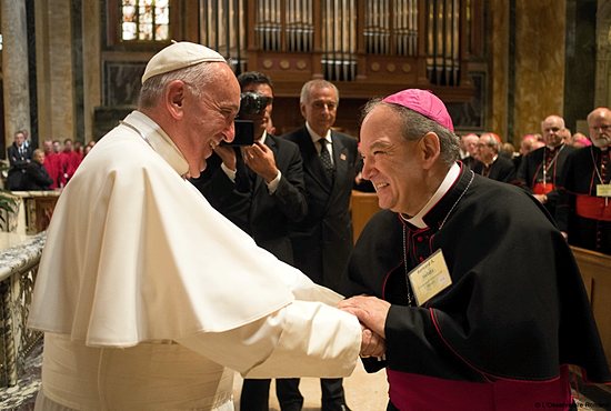 Archbishop Bernard Hebda, apostolic administrator of the Archdiocese of St. Paul and Minneapolis, greets Pope Francis Sept. 23 after midday prayer with U.S. bishops at St. Matthew’s Cathedral in Washington, D.C. L’Osservatore Romano