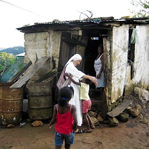 Sacred Heart of Jesus Sister Rita Kurdziel from Holy Spirit Church in Maggotty, Jamaica, makes a house call. Courtesy Sisters, Servants of the Most Sacred Heart of Jesus