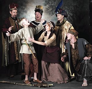 From left, Christopher Fast (King Melchoir), Vincent VanHatten (Amahl), Rich Kubista (King Balthazar), Peg Janisch (Amahl’s mother), Andy Elfenbein (King Kasper) and, kneeling, Joshua Vosberg (the page) in a scene from “Amahl and the Night Visitors.” Courtesy Joe McDonald