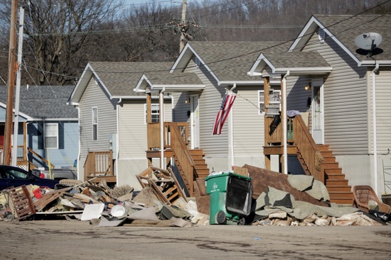 Debis is seen outside homes Jan. 5 in Pacific, Mo. The Mississippi River and other waterways in Missouri and Illinois flooded last week after 10-14 inches of rain fell over a wide swath of the two states in late December. (CNS photo/Lisa Johnston, St. Louis Review)