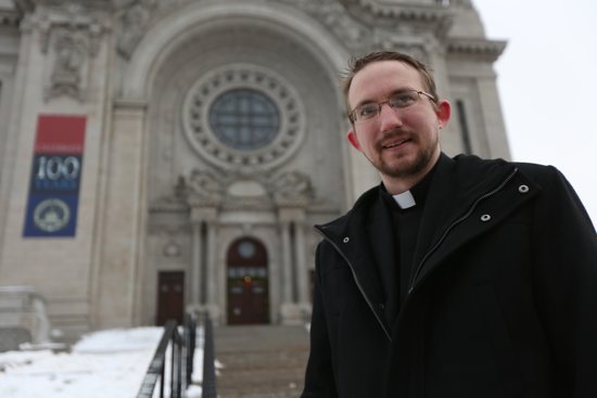 Father Michael Johnson, judicial vicar of the Metropolitan Tribunal of the Archdiocese of St. Paul and Minneapolis, stands outside the Cathedral of St. Paul, where tribunal staff will be available Ash Wednesday to answer questions about the annulment process. Dave Hrbacek/The Catholic Spirit