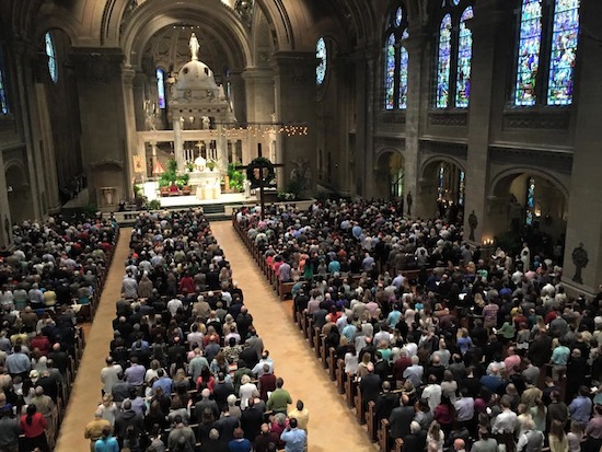 Basilica of St. Mary added hundreds of extra chairs for Masses on Easter, but their were still scores who had to stand at the 9:30 a.m. Mass. Dave Hrbacek/The Catholic Spirit