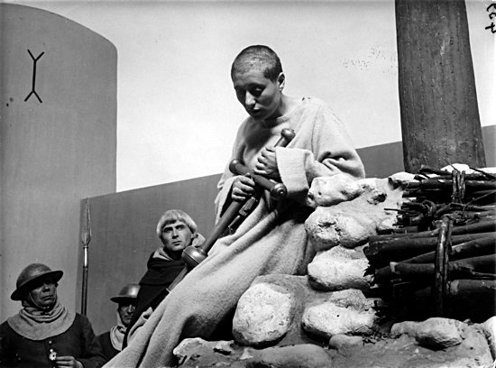 A scene from “The Passion of Joan of Arc,” an acclaimed 1928 silent film based on the record of the saint’s 1431 trial in Rouen, France. The Oratorio Society of Minnesota will pair the film with music for productions at the Cathedral of St. Paul and the Basilica of St. Mary. Public domain