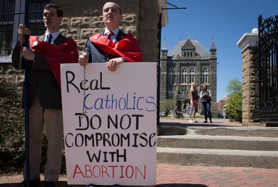 Pro-life demonstrators gather outside the campus of Georgetown University in Washington April 20. CNS photo/Tyler Orsburn