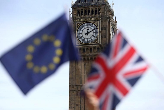 A European Union flag and British Union flag are seen at Parliament Square in London June 19. Voters in the United Kingdom voted June 23 to leave the European Union. CNS photo/Neil Hall, Reuters