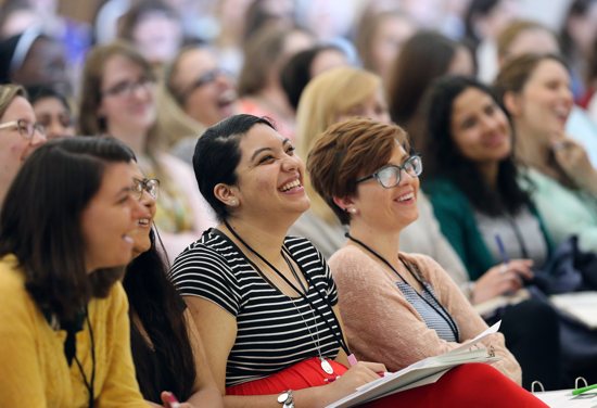 Women laugh June 8 as they listen to keynote speaker Helen Alvare, a law professor at George Mason University in Arlington, Va., during "Given," a leadership forum for young Catholic women at The Catholic University of America in Washington. The six-day event was sponsored by the Council of Major Superiors of Women Religious. CNS photo/Bob Roller
