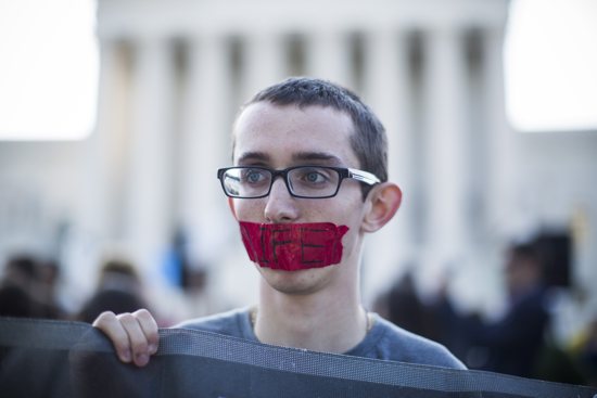 A young pro-life supporter stands outside the U.S. Supreme Court June 26 during protests in Washington. The following day the Supreme Court ruled 5-3 in Whole Woman's Health v. Hellerstedt, striking down two provisions of a 2013 Texas law regulating abortion in that state. CNS
