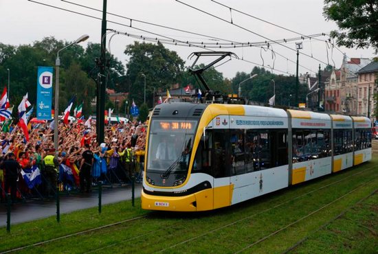 Pope Francis arrives on a tram for the World Youth Day welcoming ceremony in Blonia Park in Krakow, Poland, July 28. CNS photo/Paul Haring)