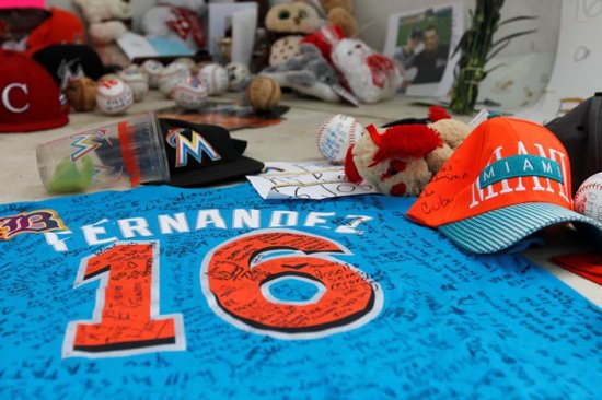 A makeshift memorial made by fans mourning the death of Miami Marlins pitcher Jose Fernandez is seen Sept. 26 outside Marlins Park in Miami. The 24-year-old pitcher, who defected from Cuba at 15 and went on to become one of baseball's brightest stars, was killed Sept. 25 in a boating accident in Miami Beach, along with two other men. CNS photo/Andrew Innerarity, Reuters