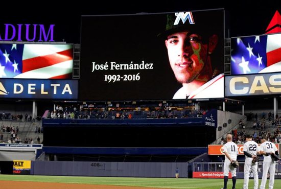 A moment of silence is observed for Miami Marlins Jose Fernandez prior to the New York Yankees taking on the Boston Red Sox Sept. 27 at Yankee Stadium. The 24-year-old pitcher, who defected from Cuba at 15 and went on to become one of baseball's brightest stars, was killed Sept. 25 in a boating accident in Miami Beach, along with two other men. CNS photo/Adam Hunger, USA TODAY Sports via Reuters