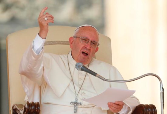 Pope Francis speaks during his general audience in St. Peter's Square at the Vatican Sept. 14. CNS photo/Paul Haring)