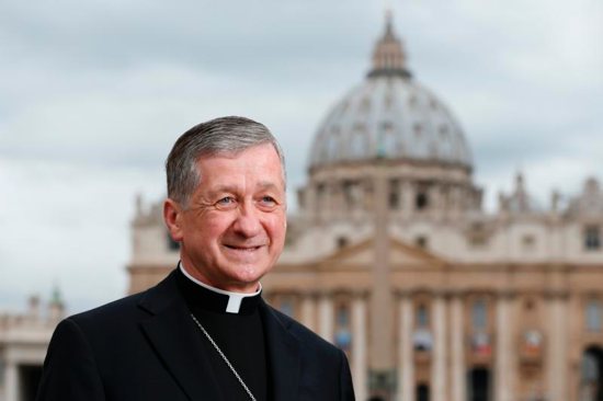 Cardinal-designate Blase J. Cupich of Chicago is pictured with St. Peter's Basilica in the background in Rome Oct. 13. The cardinal-designate is one of 17 new cardinals to be created by Pope Francis at a Vatican consistory Nov. 19. CNS photo/Paul Haring