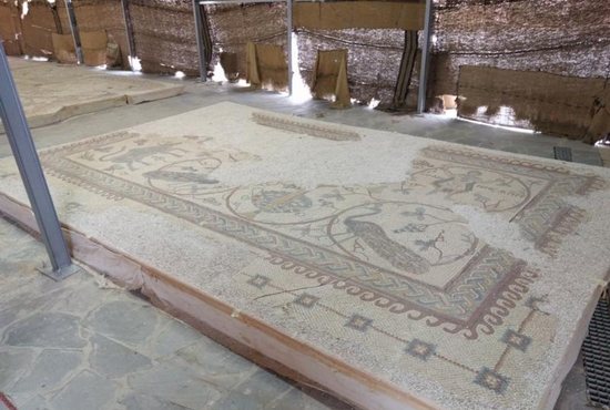 Restored mosaics are seen on display in front of the Memorial of Moses on the top of Mount Nebo in Jordan Oct. 10. The memorial has reopened its doors to the public amid festivities after a nearly decade of restoration. CNS photo/Greg Tarczynski