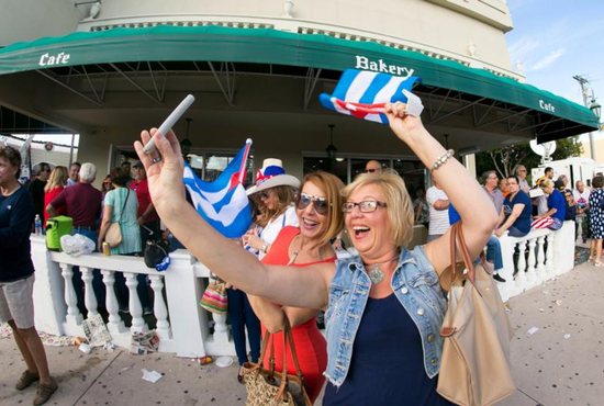 Women take a selfie in Miami's Little Havana Nov. 26. The death of former Cuban leader Fidel Castro triggered both excitement and a more subdued reaction among Cuban exiles in Miami. CNS photo/Tom Tracy