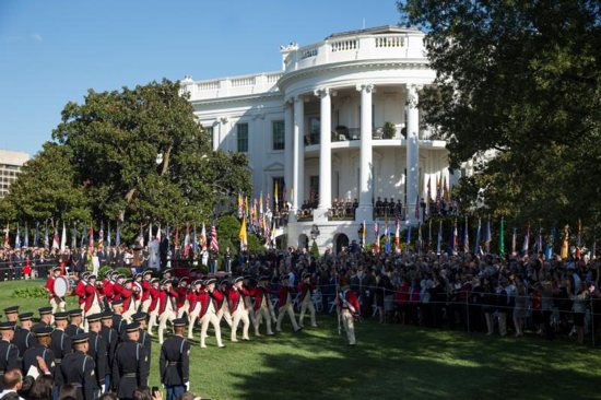 The Fife and Drum Corps marches past U.S. President Barack Obama and Pope Francis during an arrival ceremony on the South Lawn of the White House in Washington Sept. 23, 2015. The White House is part of the National Park Service system. CNS photo/Joshua Roberts