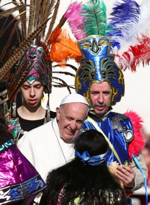 Pope Francis greets people dressed in traditional Mexican outfits during his general audience in St. Peter's Square Nov. 16. CNS photo/Alessandro Bianchi, Reuters