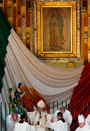 The original image of Our Lady of Guadalupe is seen as Pope Francis delivers his blessing Feb. 13 at the conclusion of Mass in the Basilica of Our Lady of Guadalupe in Mexico City. The message of Our Lady of Guadalupe is as relevant today as it was nearly 500 years ago, say scholars. CNS photo/Paul Haring