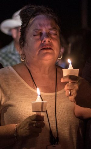Candlelight vigil after mass shooting in Texas