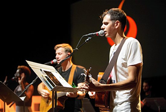 Abraham Gross performs during St. Paul’s Outreach’s 2018 School of the New Evangelization, held Aug. 5-11 at St. Olaf College in Northfield. Gross is the organization’s first music coordinator. “We talk a lot in the Catholic world about self-gift. Giving yourself away is how you find yourself, and it’s really evident in music,” he said.