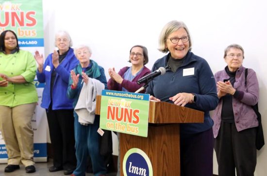 Sister Simone Campbell, executive director of Network, a Catholic social justice lobby, speaks at a rally questioning the 2017 tax cut law at Lutheran Metropolitan Ministries headquarters Oct. 20 in Cleveland. 