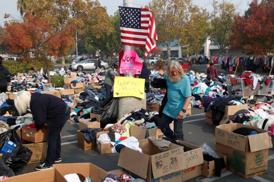 People visit a free clothing donation site for victims of the Camp Fire in Chico, Calif., Nov. 18. Pope Francis at his Sunday Angelus Nov. 18 prayed for the victims of the California wildfires. 