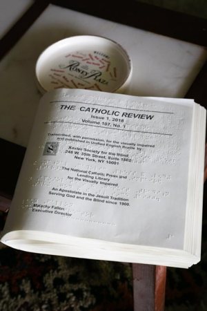 Catholic materials in Braille are seen in early May at the residence of Cuban-American Adelina Maideski, a former gift store employee at Miami International Airport, who attends St. Martha Church in Miami Shores.