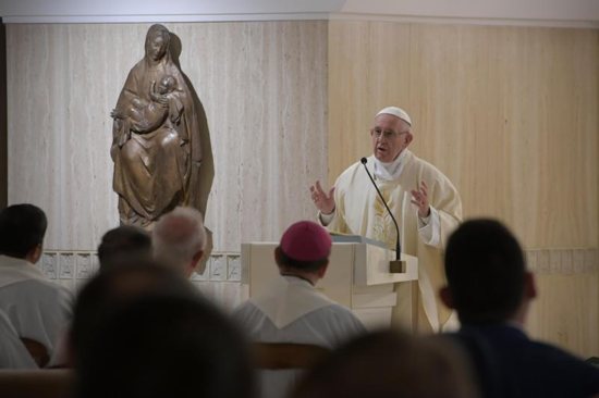 Pope Francis gives the homily as he celebrates morning Mass in the chapel of his residence, the Domus Sanctae Marthae, at the Vatican Nov. 26. 