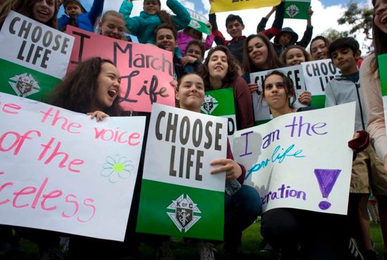 Young people participate in the annual Walk for Life in San Diego Jan. 20. A report released Nov. 21 by the Centers for Disease Control and Prevention says fewer U.S. women are having abortions than at any time since Roe v. Wade. 