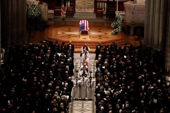 Altar servers and clergymen process out after the state funeral for former U.S. President George H.W. Bush Dec. 5 at the Episcopal Church's Washington National Cathedral.