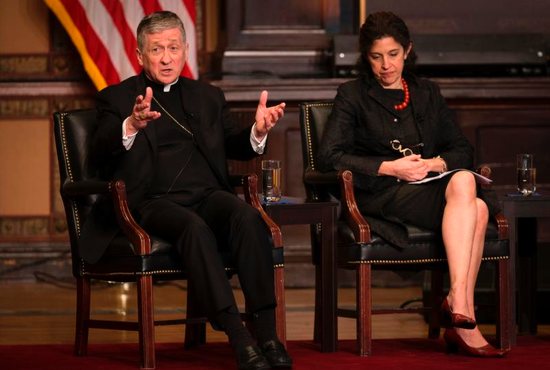 Chicago Cardinal Blase J. Cupich and Helen Alvare, a law professor at George Mason University's Antonin Scalia Law School in Arlington, Va., participate in a June 4 public dialogue about "Overcoming Polarization in a Divided Nation Through Catholic Social Thought." The event was held at Georgetown University in Washington. 