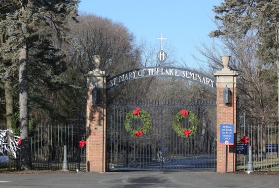 The normally open gate at the entrance to Mundelein Seminary is seen locked Jan. 3 at the University of St. Mary of the Lake in Illinois, near Chicago. The U.S. bishops are on retreat Jan. 2-8 at the seminary, suggested by Pope Francis in September, which comes as the bishops work to rebuild trust among the faithful as questions continue to revolve around their handling of clergy sex abuse.