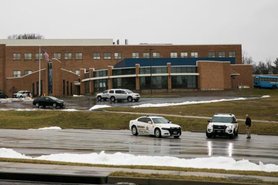 Sheriff's deputies guard in front of Covington Catholic High School Jan. 23 in Park Hills, Ky. Days after an encounter between Covington Catholic High School students and a Native American tribal leader in Washington, the Diocese of Covington announced it would begin a third-party investigation into what happened at the foot of the Lincoln Memorial following the annual March for Life Jan. 18.