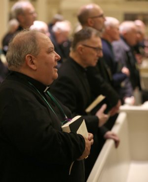Archbishop Bernard Hebda attends a prayer service at Mundelein Seminary Jan. 2 at the University of St. Mary of the Lake in Illinois, near Chicago. The U.S. bishops held a Jan. 2-8 retreat at the seminary in the wake of the clergy sexual abuse crisis.
