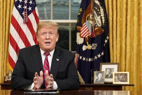 U.S. President Donald Trump delivers an address Jan. 8 televised to the nation from his desk in the Oval Office at the White House in Washington. He spoke about immigration and the southern U.S. border on the 18th day of a partial government shutdown.