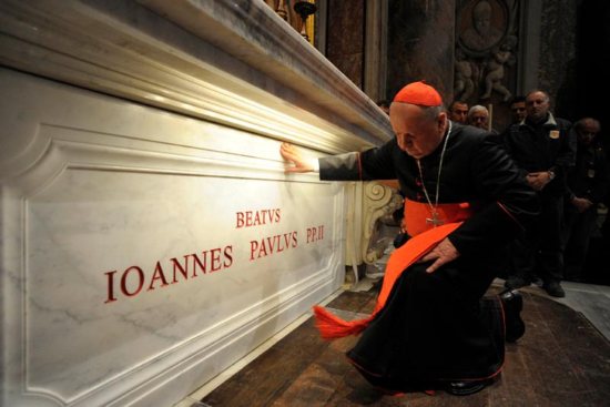 Polish Cardinal Stanislaw Dziwisz prays at the tomb of St. John Paul II in St. Peter's Basilica at the Vatican May 3, 2011. Cardinal Dziwisz issued a statement March 20 vigorously defending the pontiff from "hurtful and historically untrue" claims that he was "slack" in combating sexual abuse by Catholic clergy.
