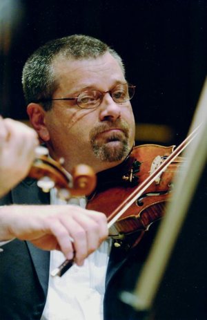 In this undated photo, David Bartolowits performs with the Indianapolis Symphony Orchestra. He played with the orchestra for 35 years then became the director of catechesis at St. John the Evangelist Parish in 2017 and was ordained a deacon for the Indianapolis Archdiocese that same year.